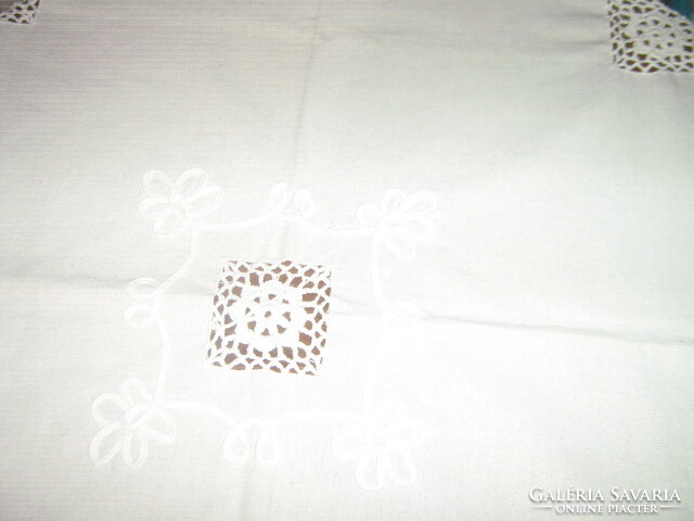 Beautiful hand-crocheted raw white tablecloth with inset and edge sewn on