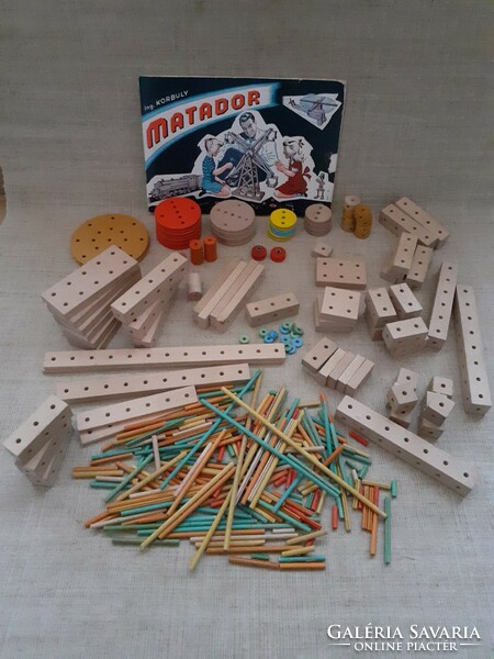 Old retro wooden matador building toy with ingredients booklet