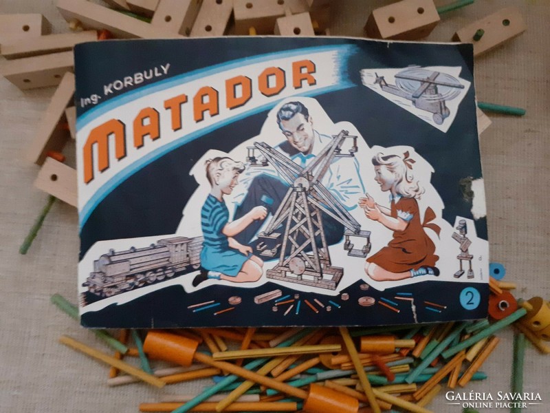 Old retro wooden matador building toy with ingredients booklet