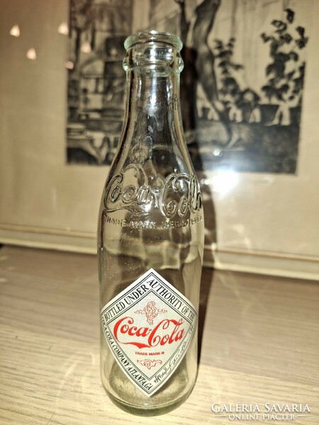 Coca-cola anniversary glass bottle