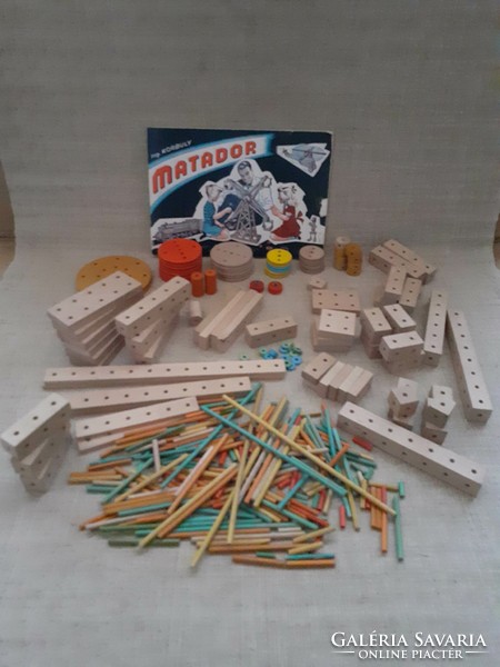 Old retro wooden matador building toy with ingredients booklet