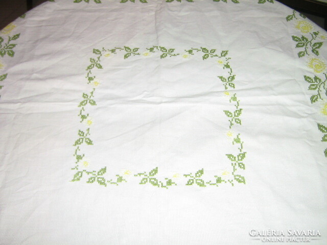 Beautiful cross-stitch hand-embroidered tablecloth with yellow roses