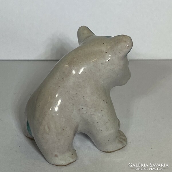 Small glazed ceramic teddy bear