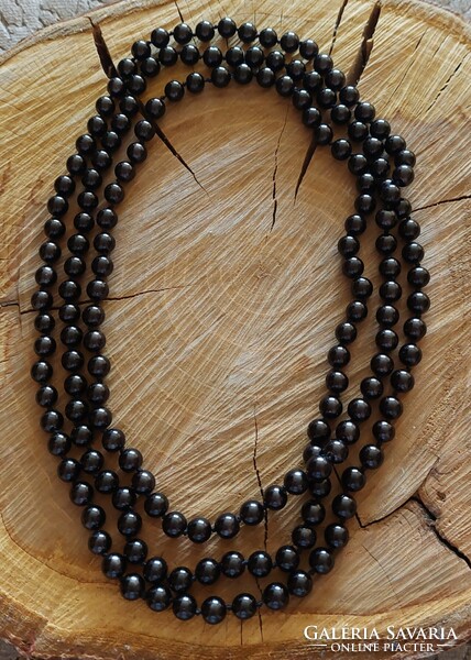 Extra long onyx necklace with knotted lacing