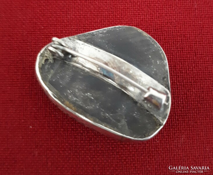 Mineral brooch in a silver socket