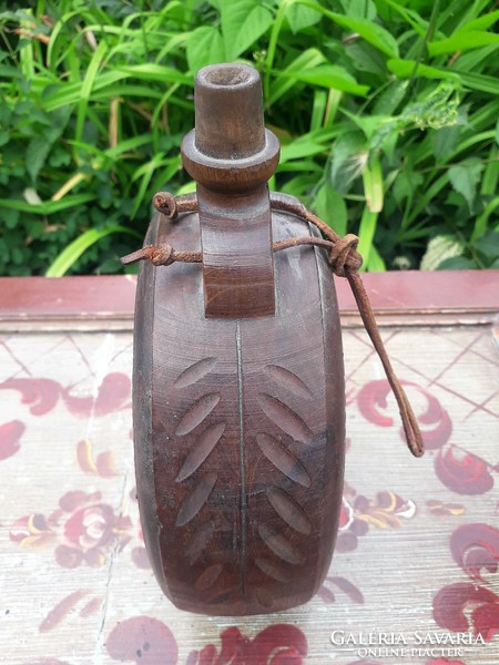 3 old water bottles / wood, ceramic, horse hair.