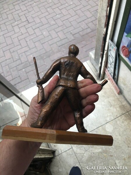 Statue made of copper, a soldier in a football jersey, 14 cm high.