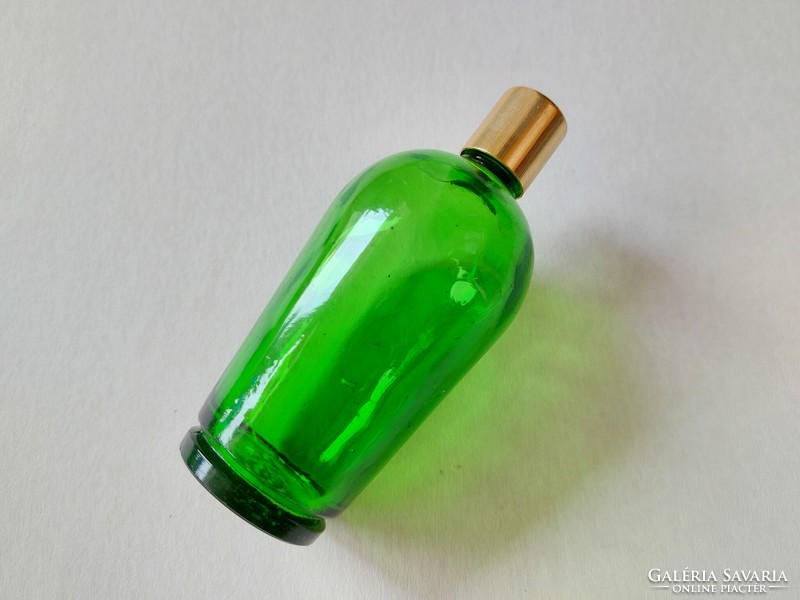 Old perfume glass retro green cologne bottle