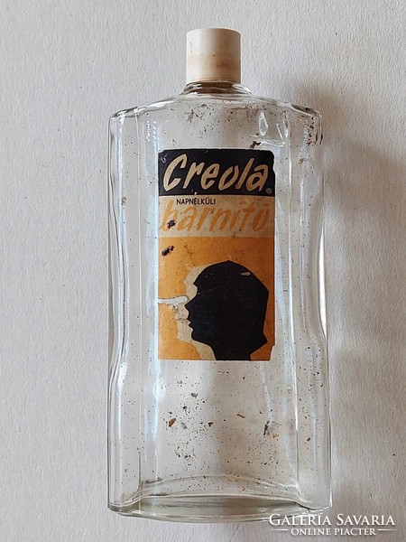 Old glass creola sunless tanning retro bottle