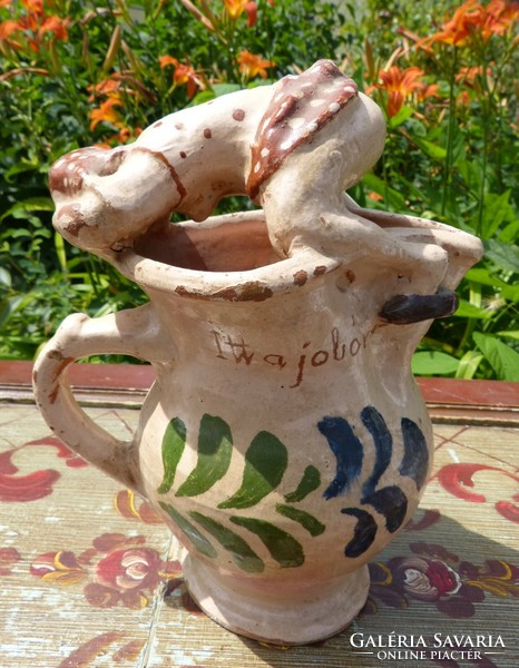 Folk ceramic jug, statue.