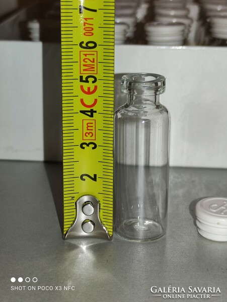It's raining!! Chinoin in new condition medicine bottle marked with rubber cap in a storage holder set of 108 pieces