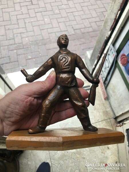 Statue made of copper, a soldier in a football jersey, 14 cm high.