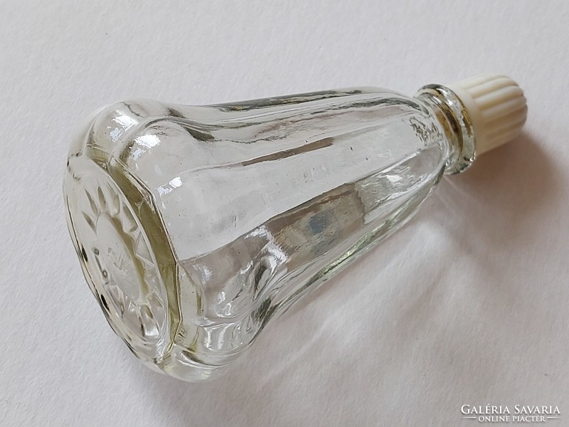 Old perfume glass cologne bottle with retro label