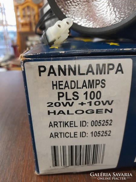 Professional new mila double halogen waterproof headlamp set in box.