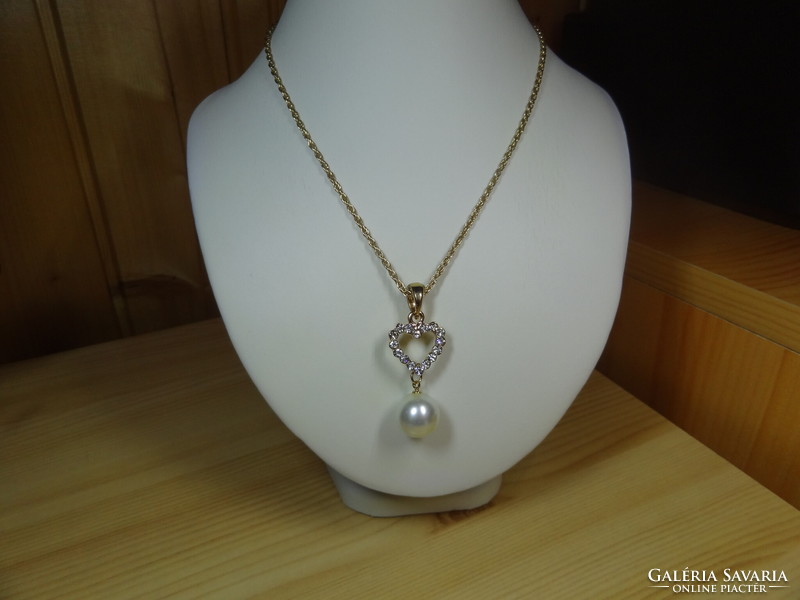 Gold-colored pendant with white glass pearls, crystals, on a very beautiful Welsh necklace.