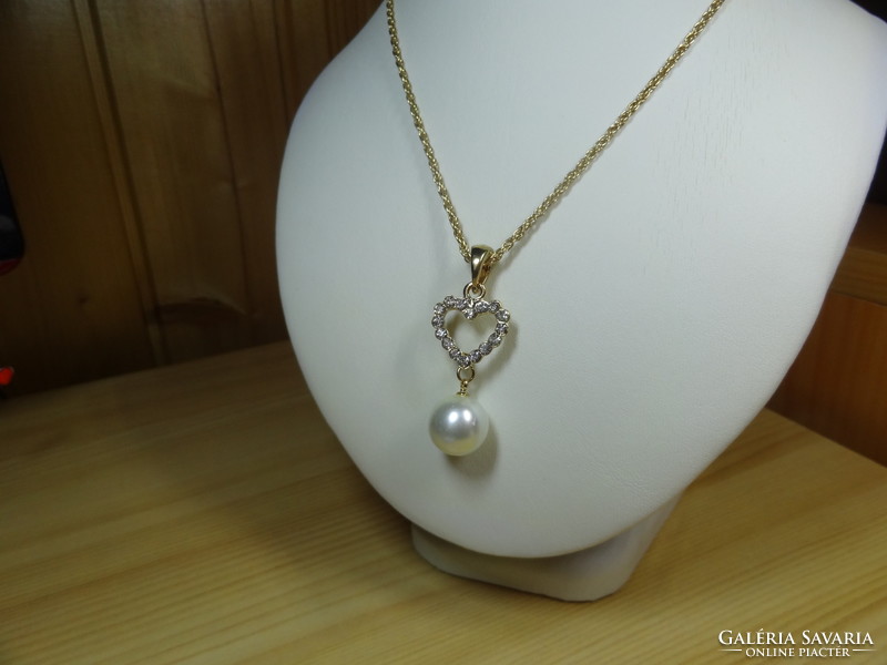 Gold-colored pendant with white glass pearls, crystals, on a very beautiful Welsh necklace.