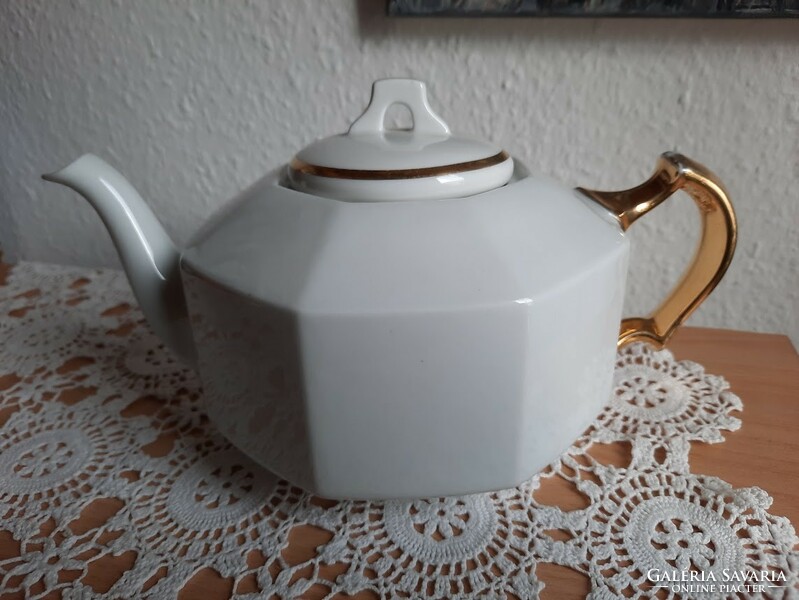 Antique porcelain teapot, with gilded decoration, marked 