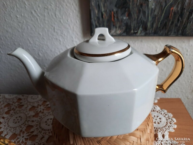 Antique porcelain teapot, with gilded decoration, marked 