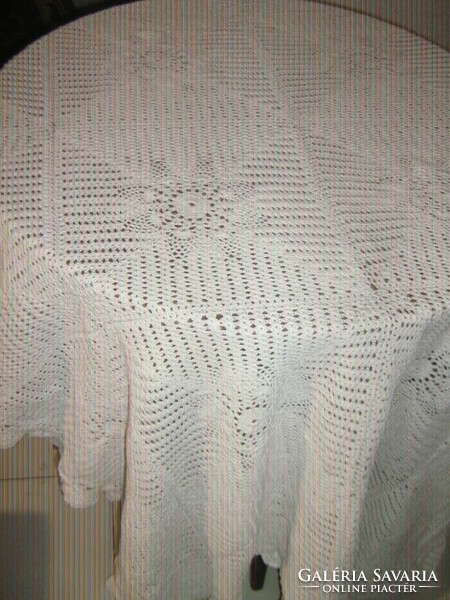 Beautiful antique white hand crocheted floral tablecloth