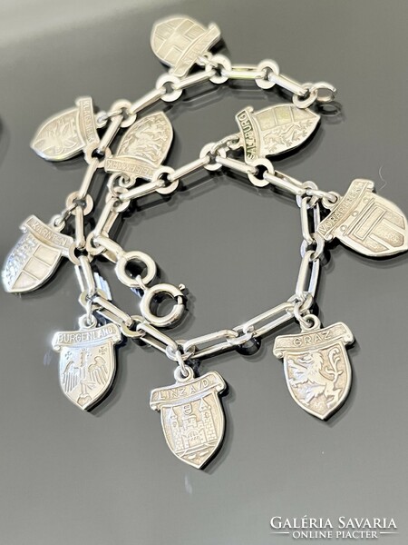 Solid silver bracelet with pendants
