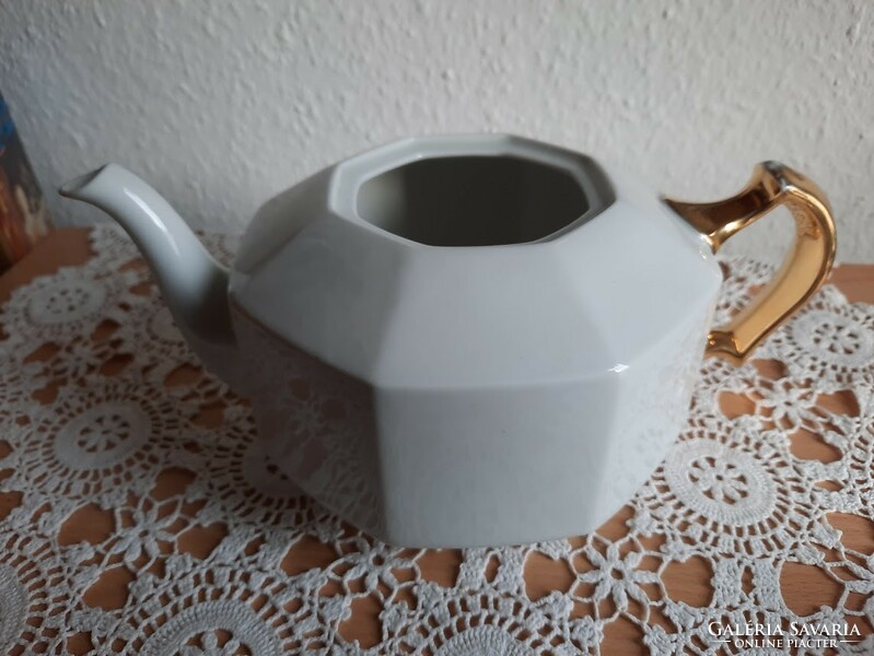 Antique porcelain teapot, with gilded decoration, marked 