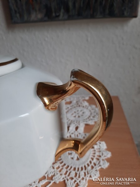 Antique porcelain teapot, with gilded decoration, marked 
