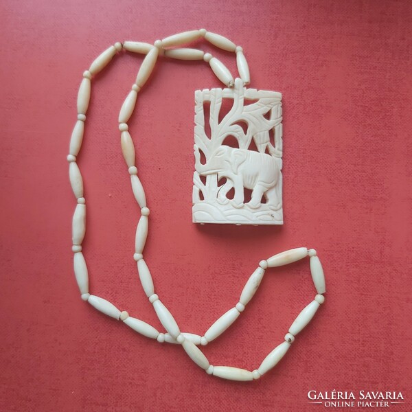 Elephant handmade bone necklace with pendant.