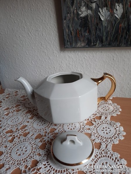 Antique porcelain teapot, with gilded decoration, marked 