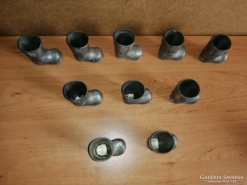 Pewter cup in the shape of a boot 10 pieces in one (qv)