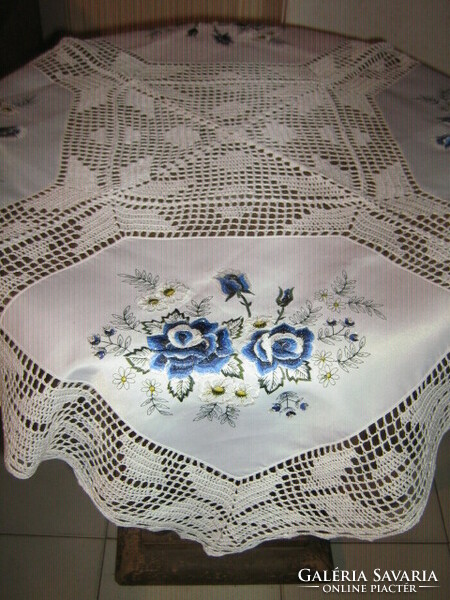 Beautiful hand-crocheted edge and crocheted inset machine-embroidered tablecloth