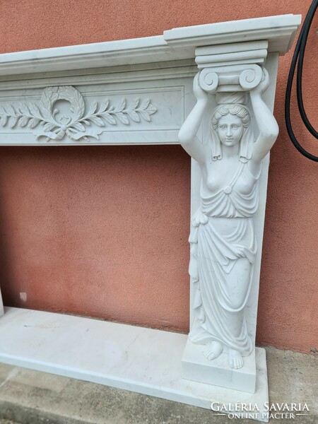 White human-shaped marble fireplace