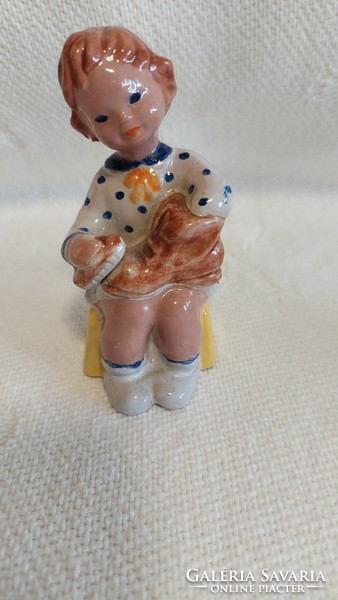 Little girl taking off her shoes. Hand painted! In perfect condition 8!