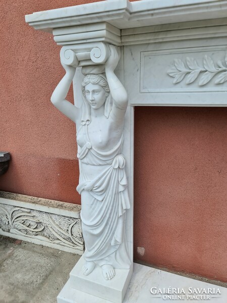 White human-shaped marble fireplace