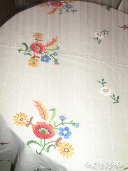 Beautiful antique hand-embroidered poppy flower tablecloth