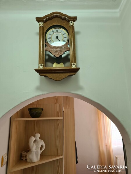 Hermle, radio-controlled, wall-mounted wooden pendulum clock