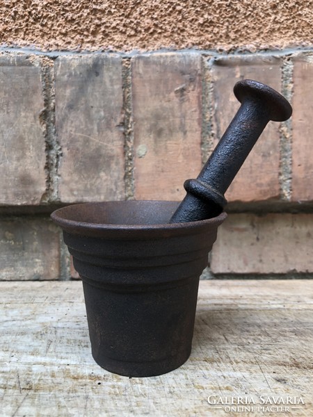 19. An old apothecary's mortar from the beginning of the s