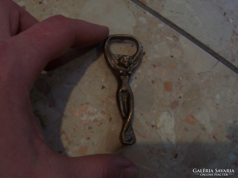 Women's nude copper bottle opener