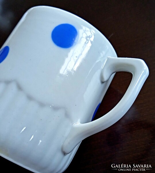 Blue polka dot mug with a wavy skirt