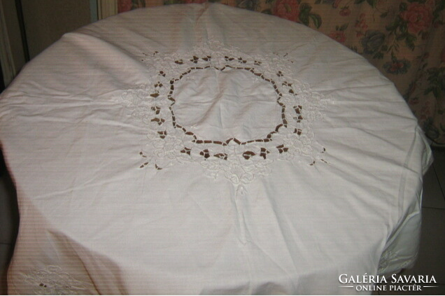 Azure tablecloth with beautiful Madeira embroidered flowers in the middle