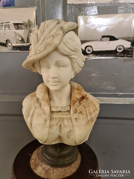 Marble bust of a lady in a hat, bust