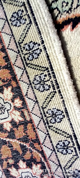 Hand-knotted silk carpet is negotiable