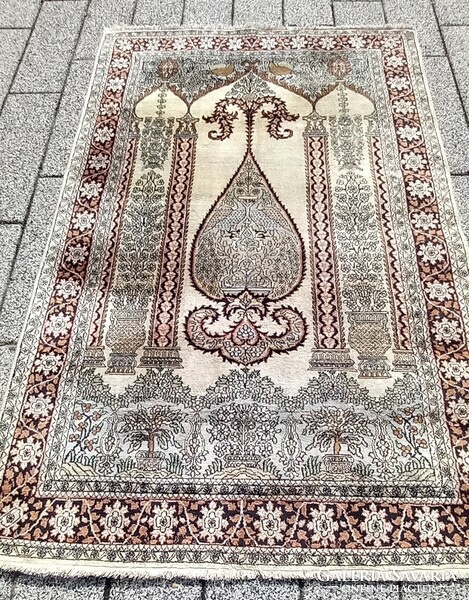Hand-knotted silk carpet is negotiable