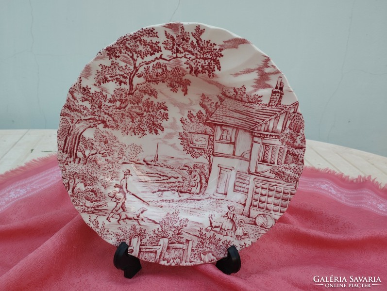 A spectacular English porcelain deep plate
