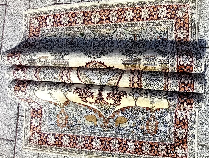 Hand-knotted silk carpet is negotiable