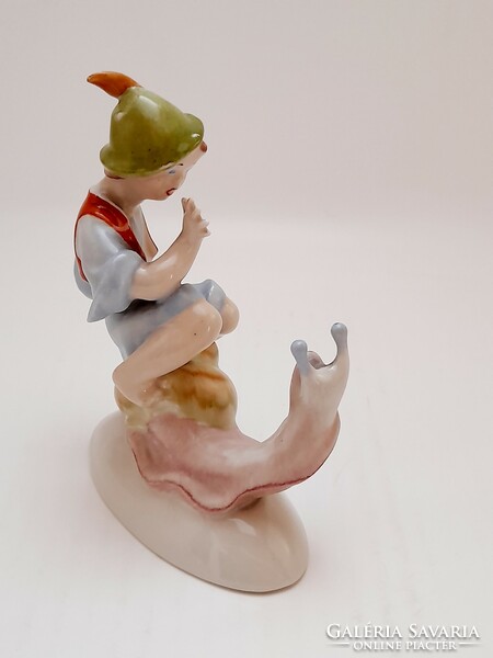 Drasche porcelain boy riding a snail