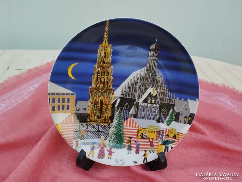 Christmas street scene drawing on a porcelain plate