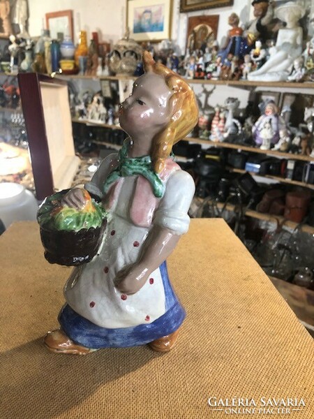 Hops ceramics, girl selling flowers, 18 cm tall.