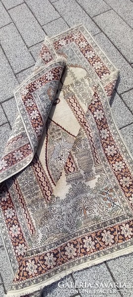 Hand-knotted silk carpet is negotiable