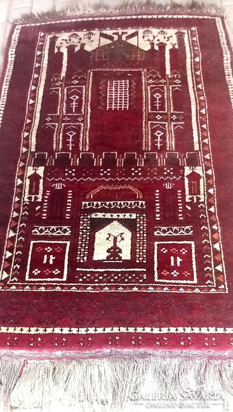 Hand-knotted afghan rug is negotiable