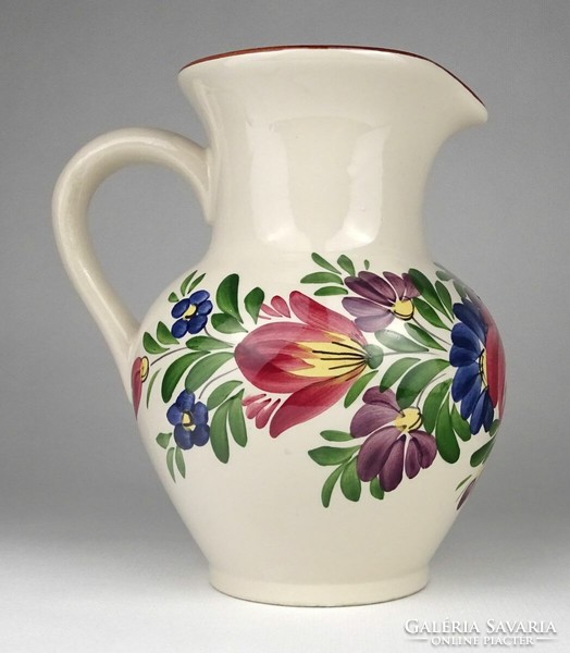1N361 old glazed earthenware jug with flower decoration 17.5 Cm